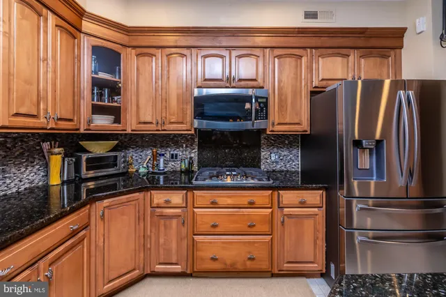 a view of a bedroom with furniture and windows