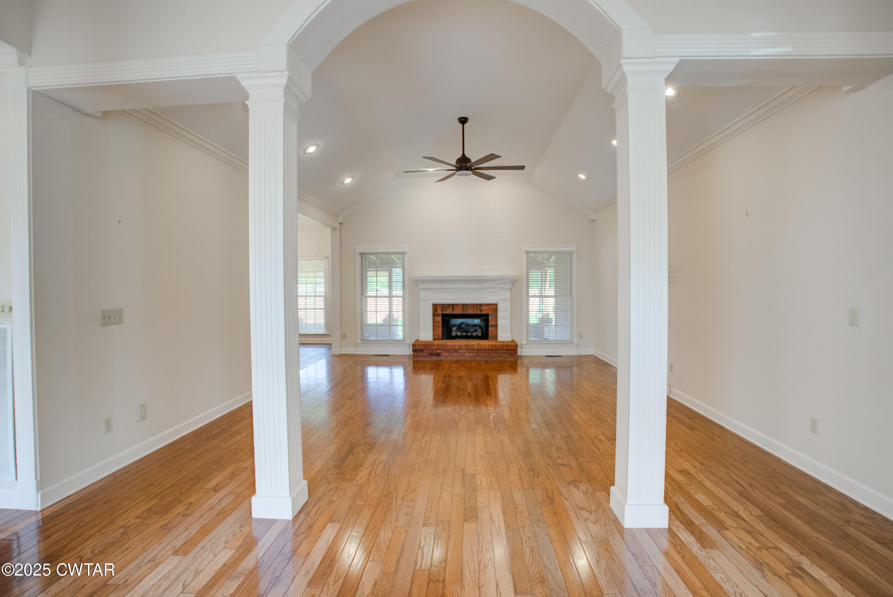 7 Sutton Place Jackson, TN 38305 - Photo 11 of 25 a view of livingroom with hardwood floor and a ceiling fan