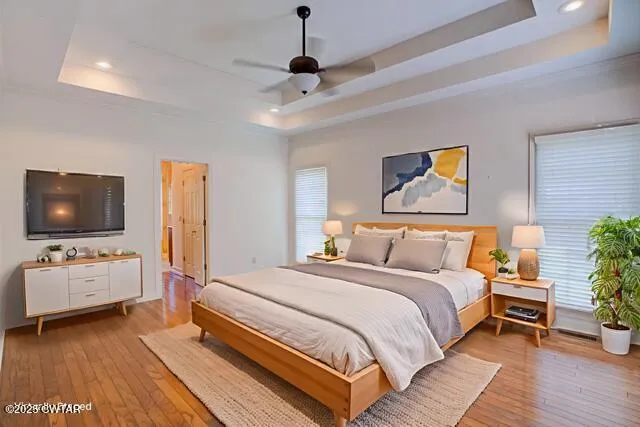 a bathroom with a granite countertop bathtub shower and sink