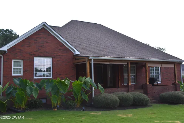 a house view with a garden space