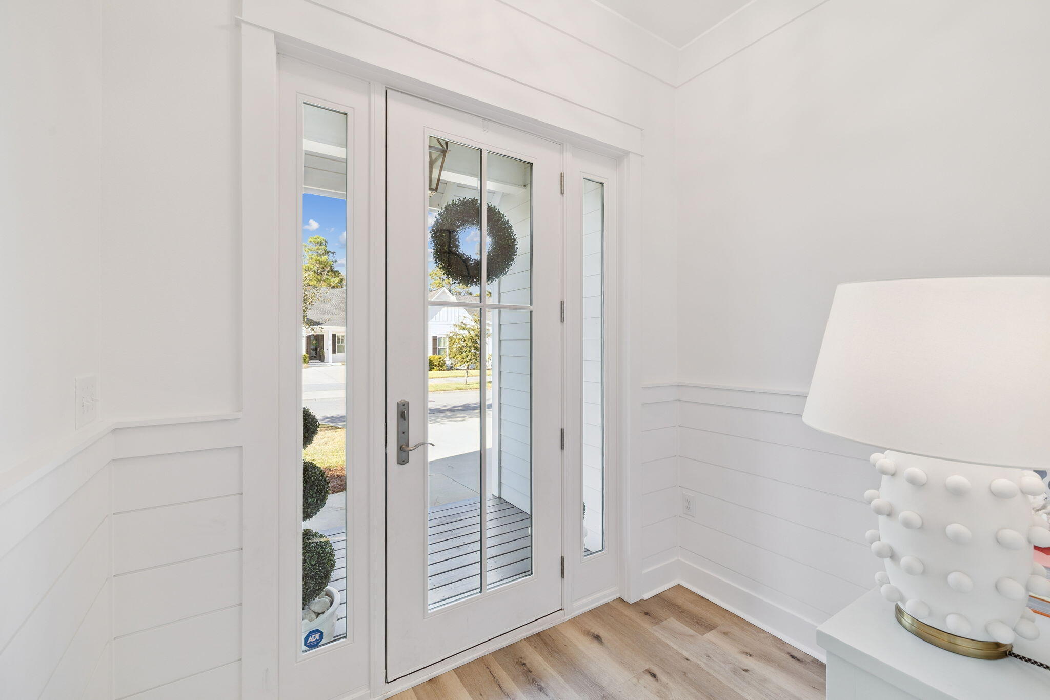 184 Sidecamp Rd Inlet Beach Inlet Beach, FL 32461 - Photo 18 of 48 hallway with wooden floor and glass door