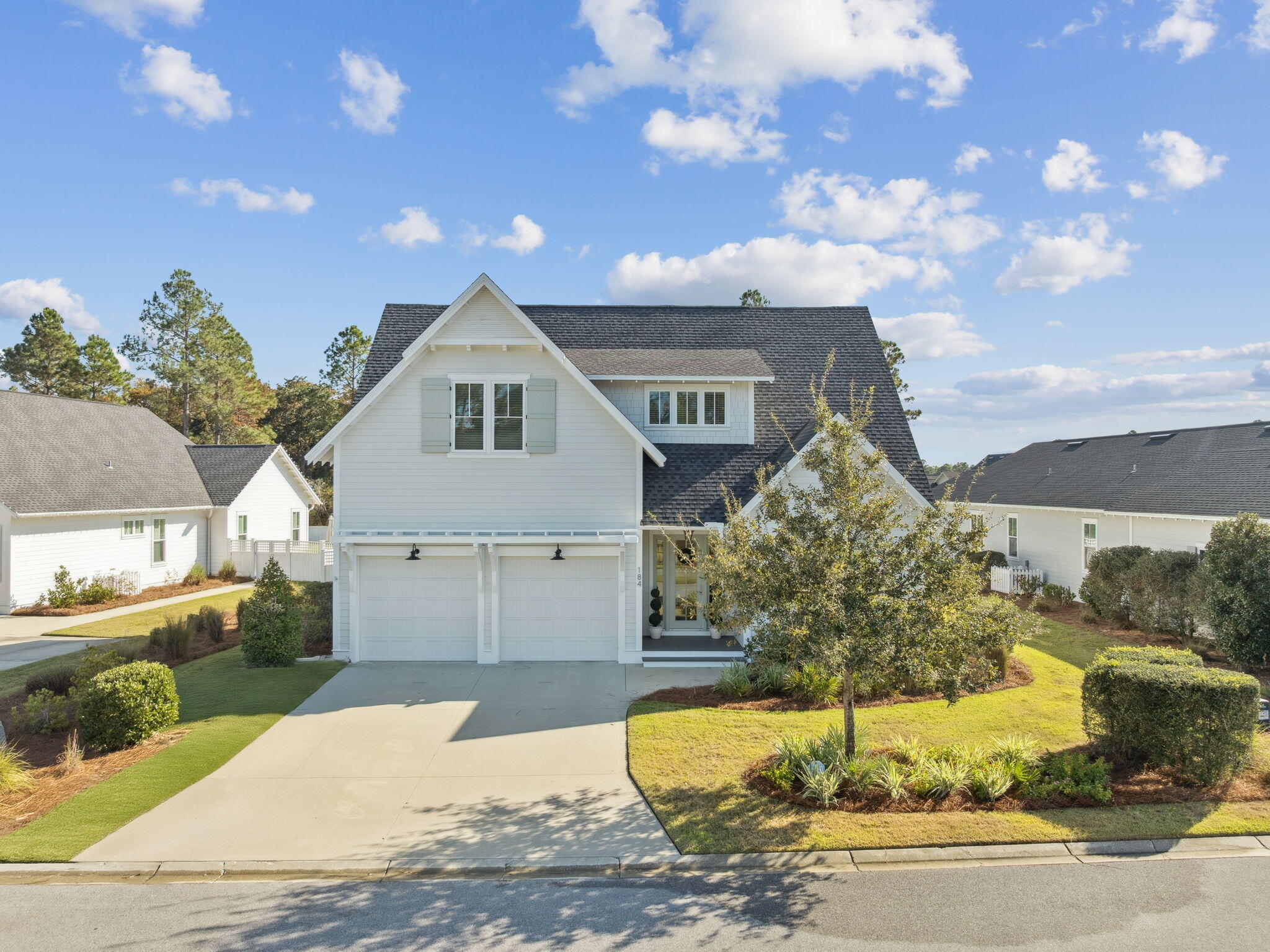 184 Sidecamp Rd Inlet Beach Inlet Beach, FL 32461 - Photo 2 of 48 a front view of a house with a yard