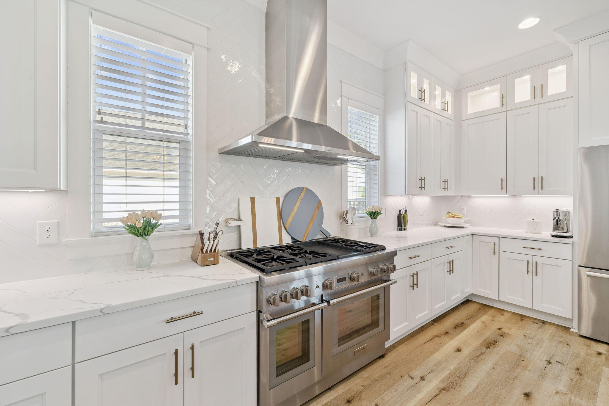 184 Sidecamp Rd Inlet Beach Inlet Beach, FL 32461 - Photo 23 of 48 a kitchen with white cabinets appliances and a window