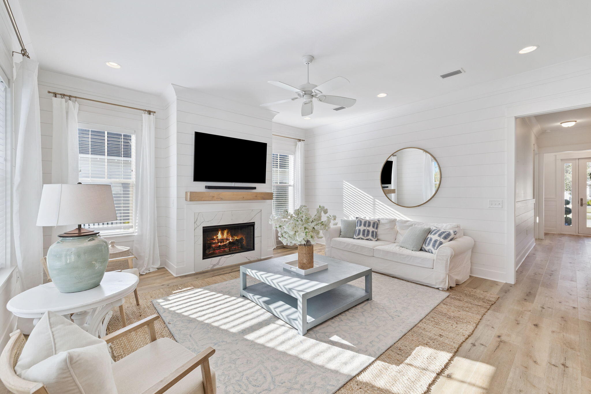 184 Sidecamp Rd Inlet Beach Inlet Beach, FL 32461 - Photo 25 of 48 a living room with furniture a fireplace and a flat screen tv