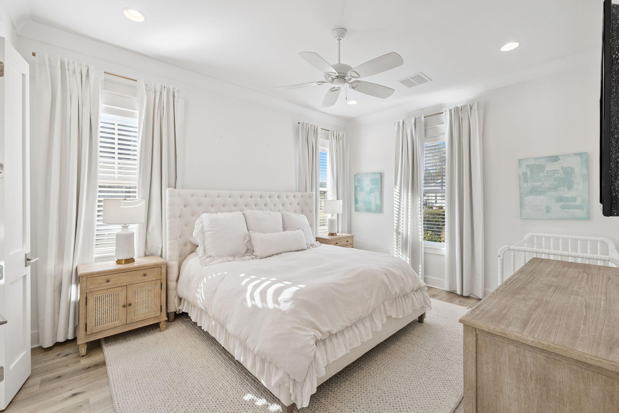 184 Sidecamp Rd Inlet Beach Inlet Beach, FL 32461 - Photo 29 of 48 a bedroom with a large bed and a chandelier