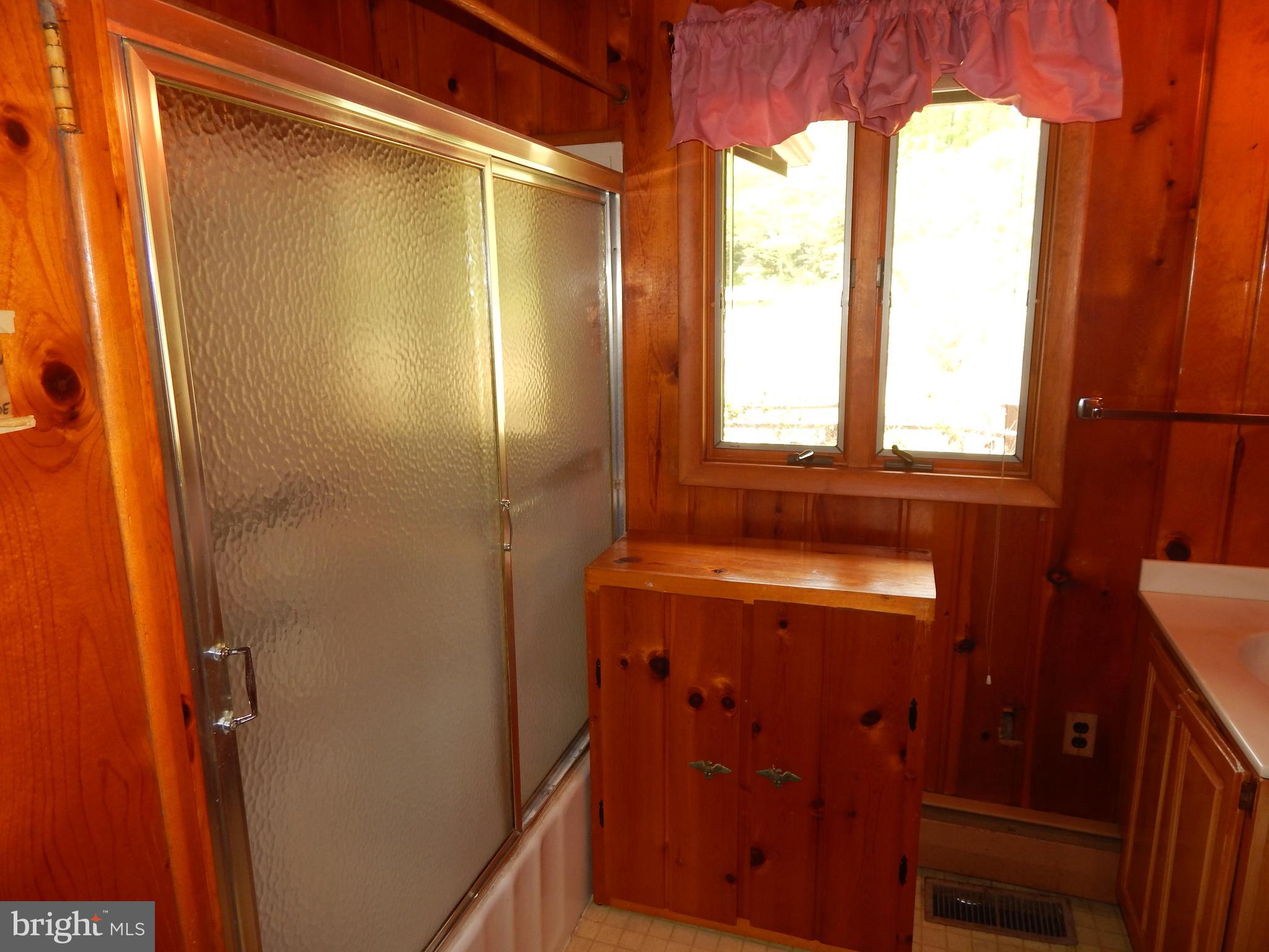 4020 Dahlia Road Port Republic, MD 20676 - Photo 14 of 23 a bathroom with a shower and a sink