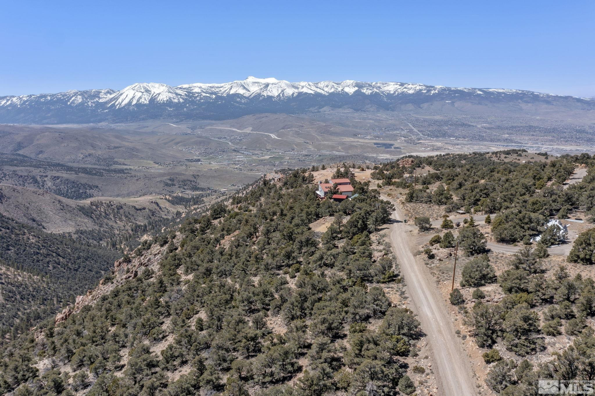770 Buckeye Road Reno, NV 89521 - Photo 8 of 18 a view of a house with a mountain