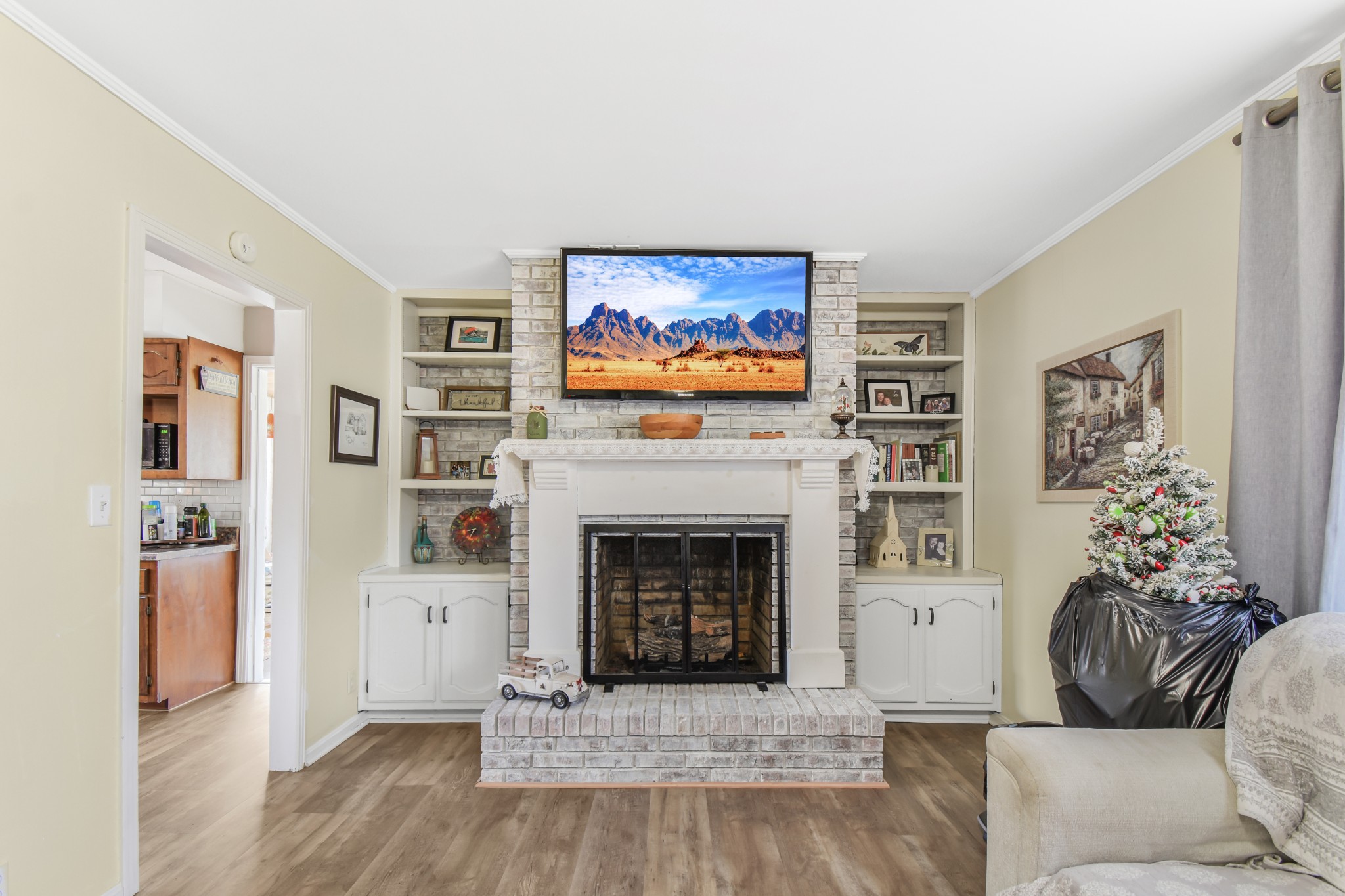 55 Morris Lane Carthage, TN 37030 - Photo 11 of 47 a living room with furniture a flat screen tv and a fireplace