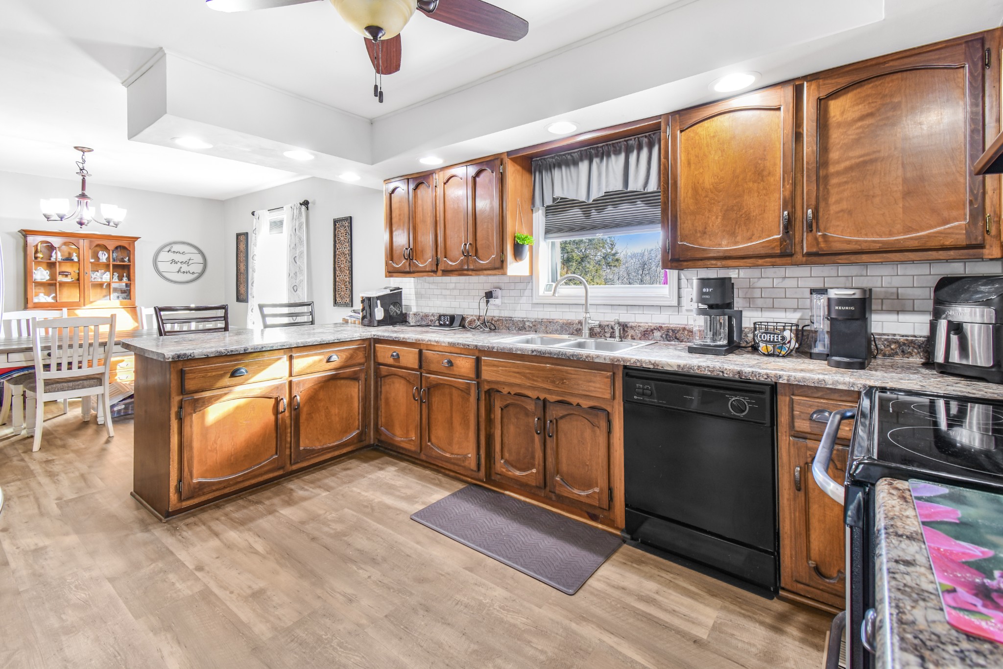 55 Morris Lane Carthage, TN 37030 - Photo 12 of 47 a kitchen with a sink stove and cabinets