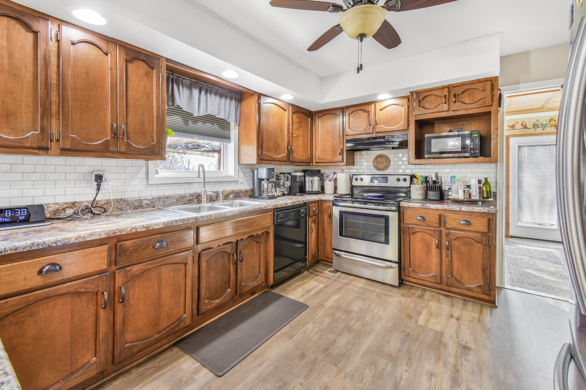 55 Morris Lane Carthage, TN 37030 - Photo 13 of 47 a kitchen with stainless steel appliances granite countertop a stove sink and cabinets