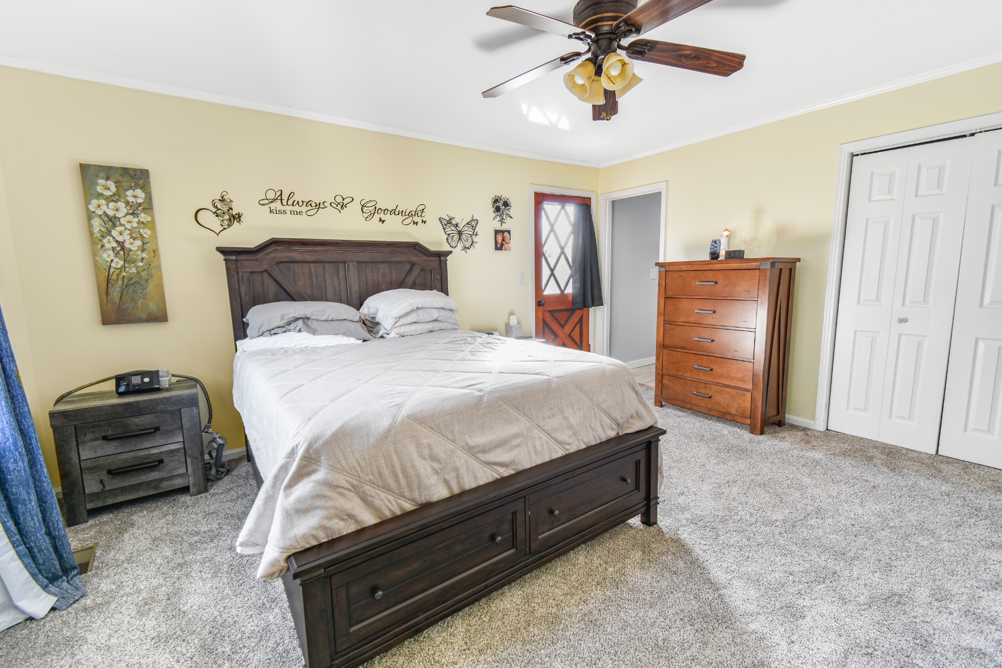 55 Morris Lane Carthage, TN 37030 - Photo 21 of 47 a bedroom with a bed and a chandelier