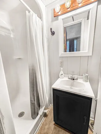 a utility room with sink dryer and washer