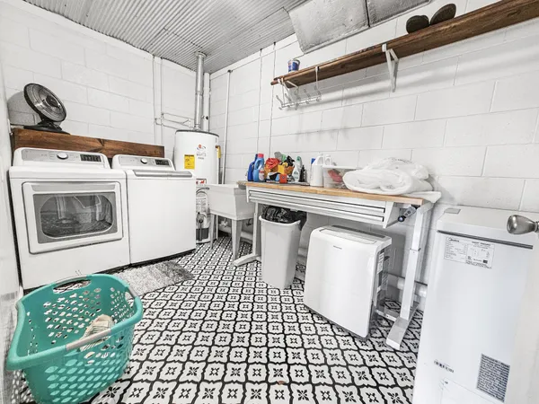 a workspace with furniture and a window