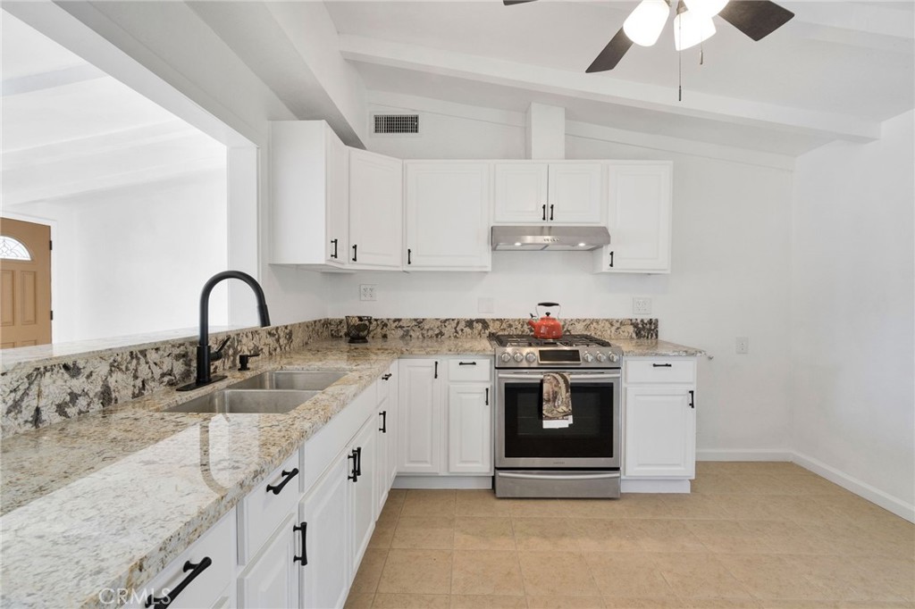 27331 Perkins Road Madera, CA 93637 - Photo 12 of 25 a view of kitchen with a sink and cabinets