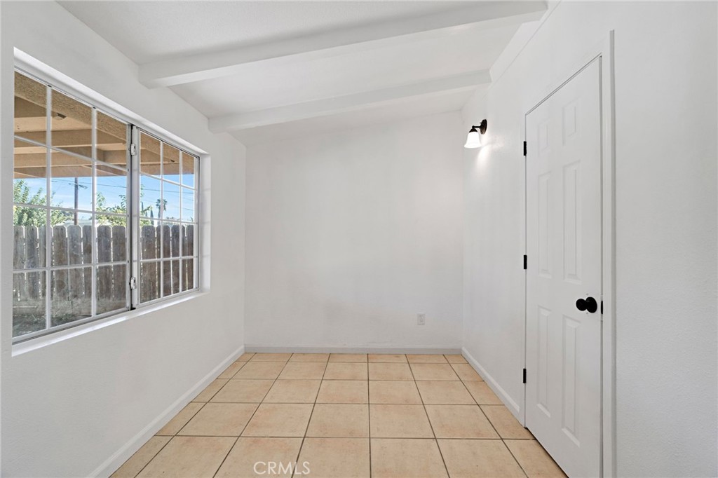 27331 Perkins Road Madera, CA 93637 - Photo 13 of 25 a view of an empty room with a window