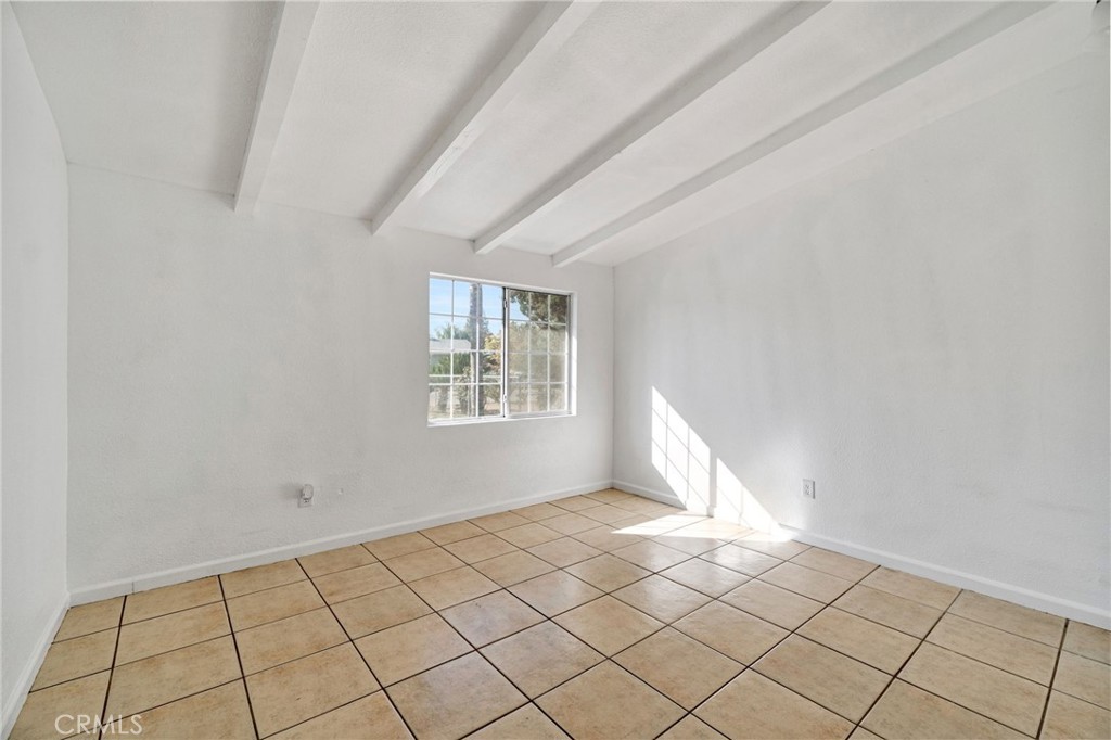 27331 Perkins Road Madera, CA 93637 - Photo 18 of 25 a view of an empty room and window