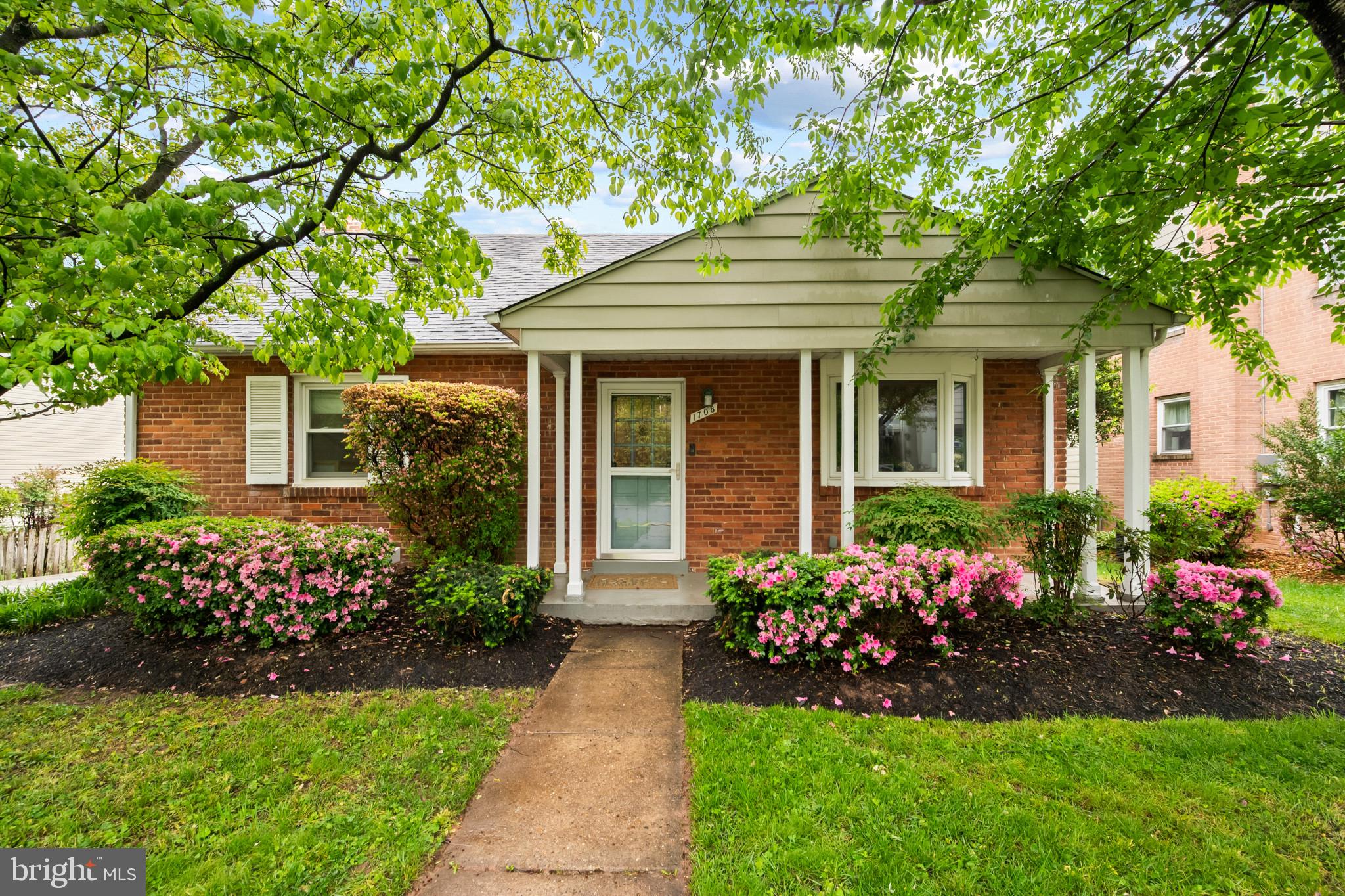 1708 Brisbane Street Silver Spring, MD 20902 - Photo 1 of 43 Charming brick home with vibrant blooms.