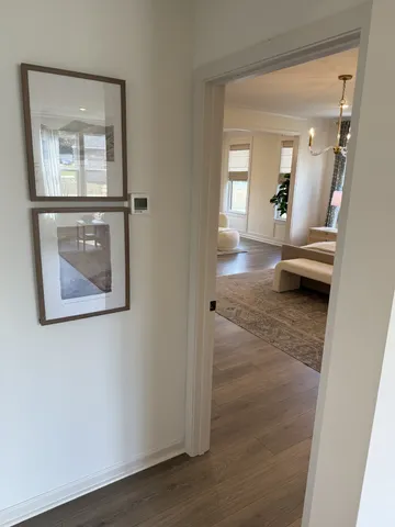 wooden floor with a bathroom