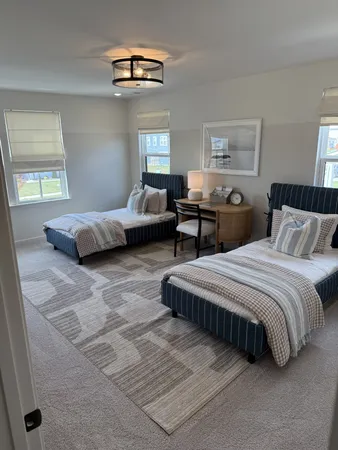 a bed room with bed and a window