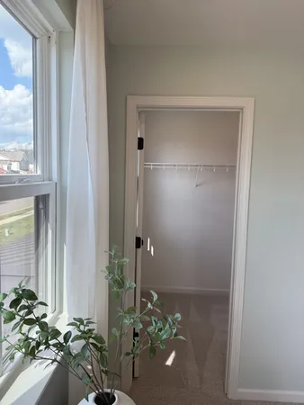 a bathroom with a toilet and shower