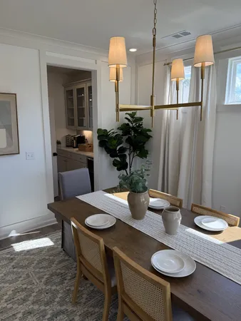 a table and chairs in a kitchen