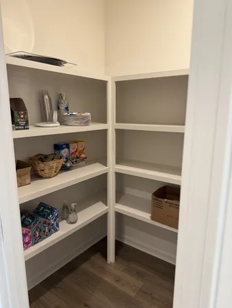 a living room with a book shelf