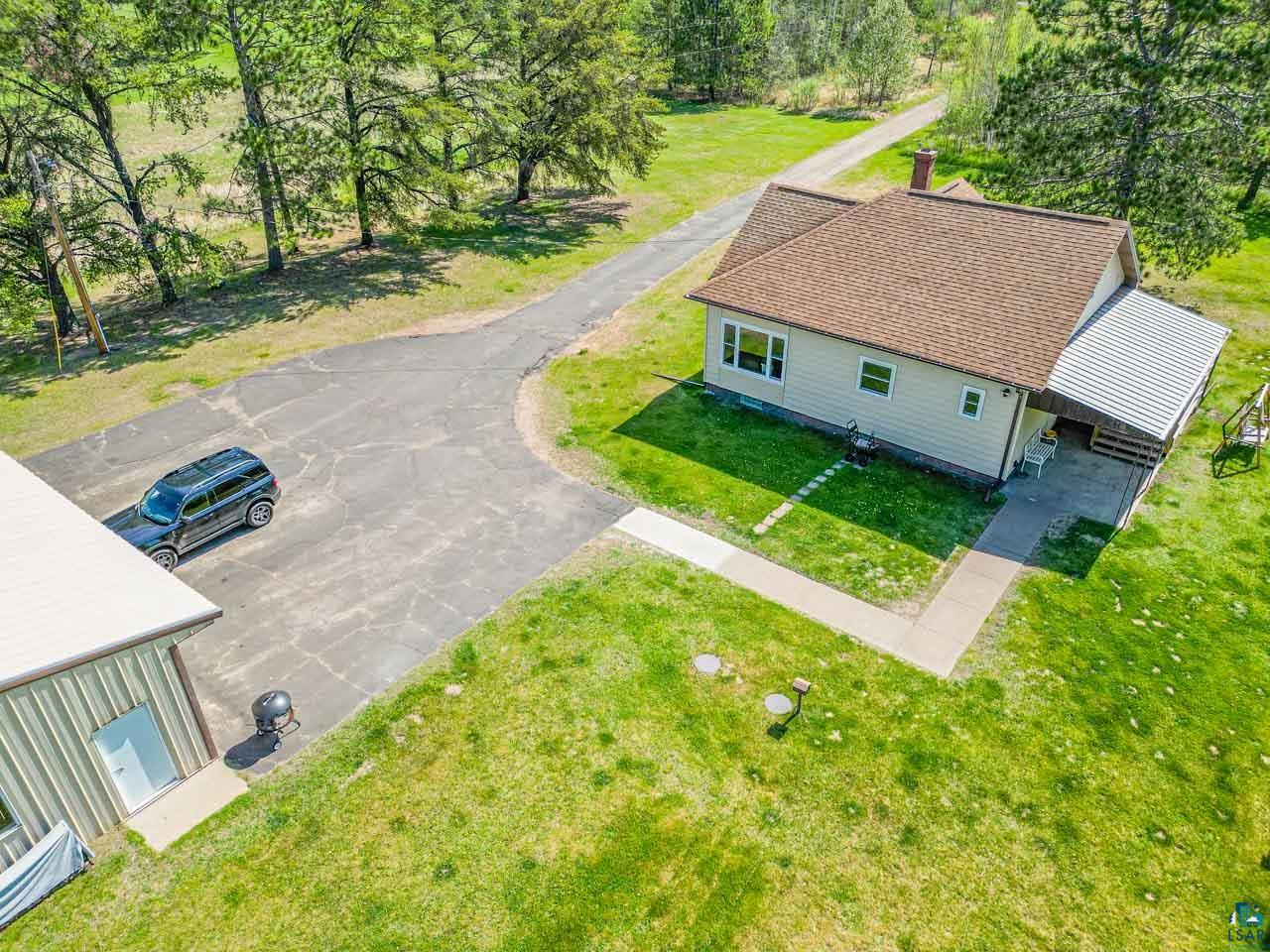 2581 O'Rourke Road Hibbing, MN 55746 - Photo 50 of 61 Single-story residence featuring a shingle roof and light-toned siding