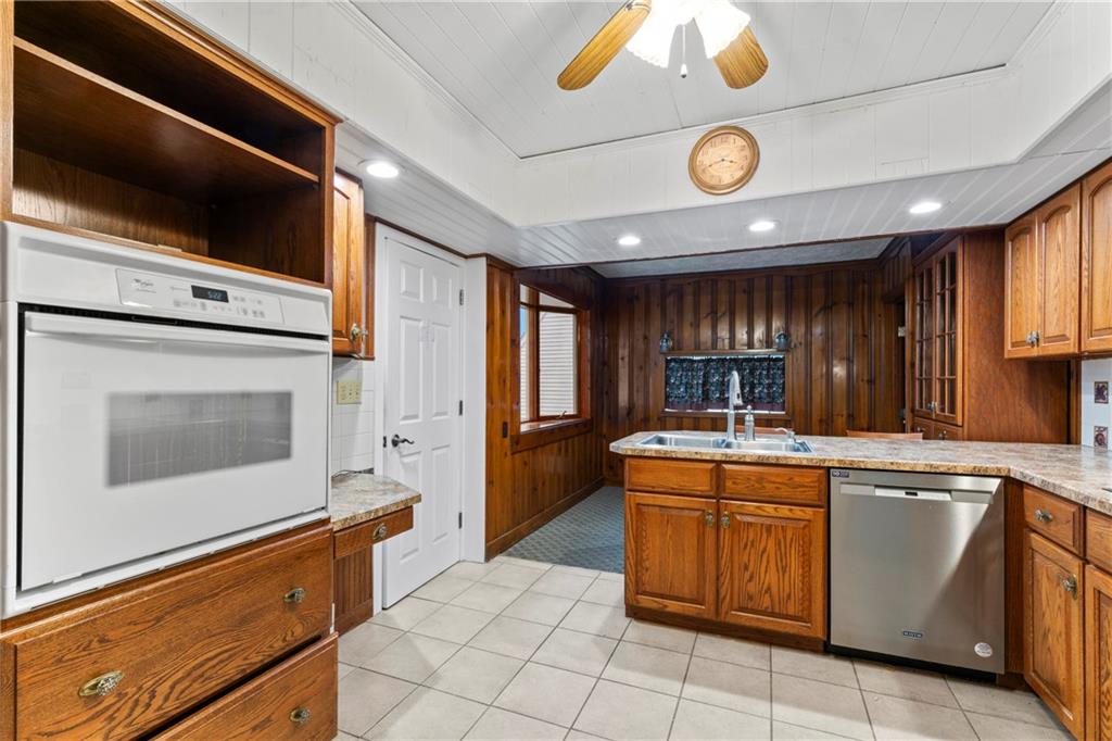 903 37th St Extension Beaver Falls, PA 15010 - Photo 11 of 29 a kitchen with a stove and a microwave