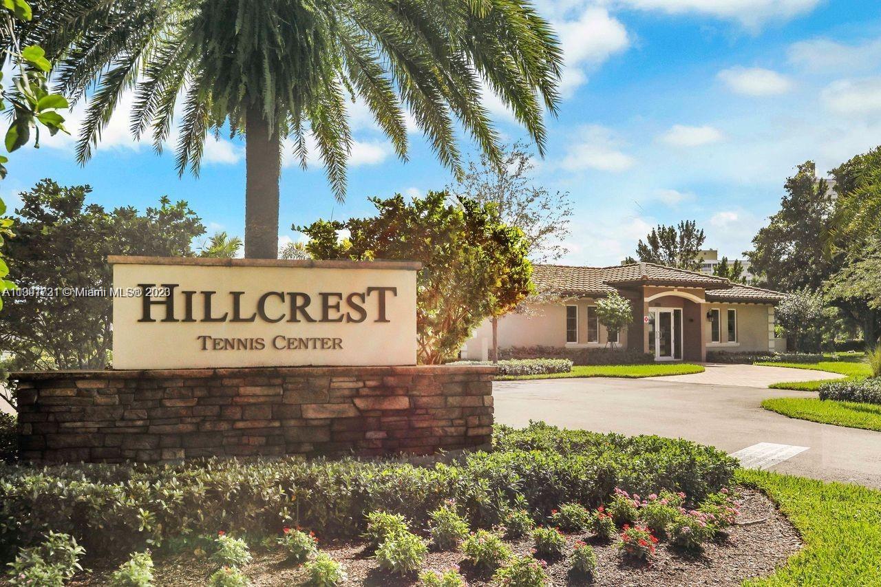 5060 Eucalyptus Drive, Unit 2 Hollywood, FL 33021 - Photo 45 of 56 a view of a house with a yard and potted plants