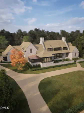 a view of a white house with a ocean view