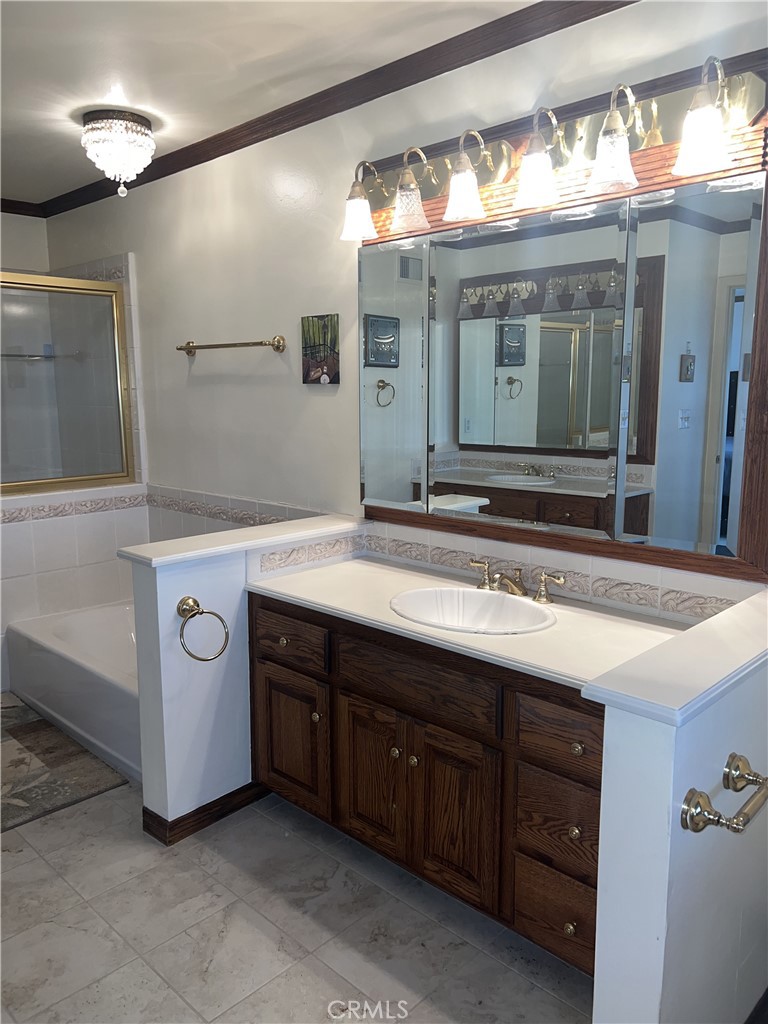 6747 Verde Ridge Road Rancho Palos Verdes, CA 90275 - Photo 19 of 34 a bathroom with a sink and a mirror