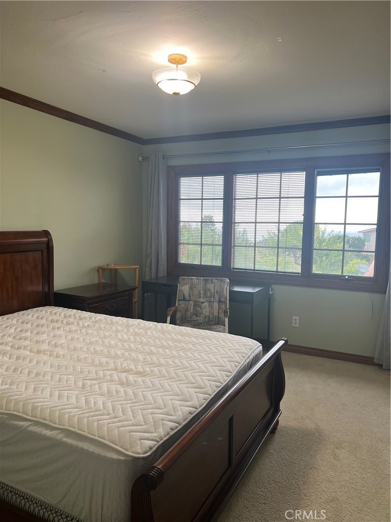 6747 Verde Ridge Road Rancho Palos Verdes, CA 90275 - Photo 26 of 34 a bedroom with a bed and a window