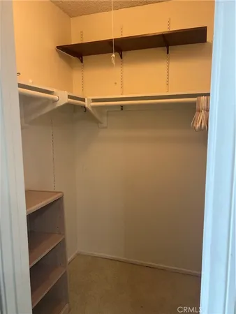 a view of an empty walk in closet
