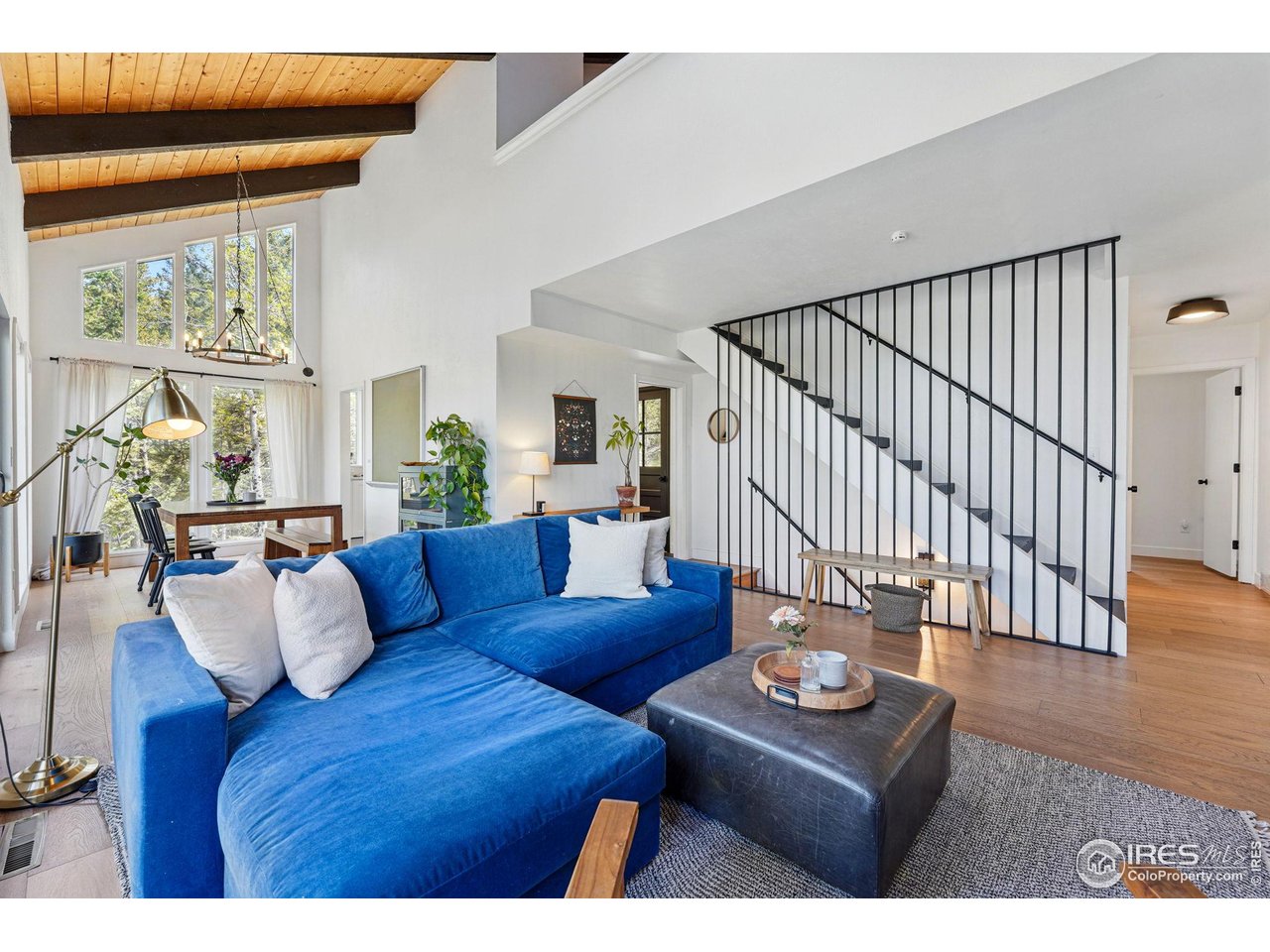 1750 Deer Trail Road Boulder, CO 80302 - Photo 11 of 50 a living room with furniture and wooden floor