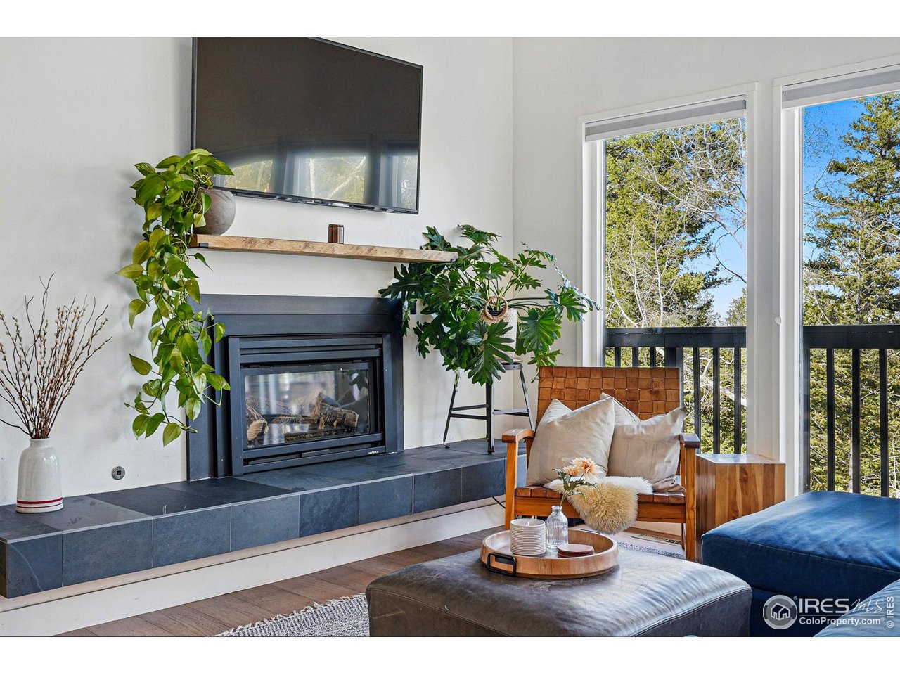 1750 Deer Trail Road Boulder, CO 80302 - Photo 12 of 50 a living room with furniture and a fireplace