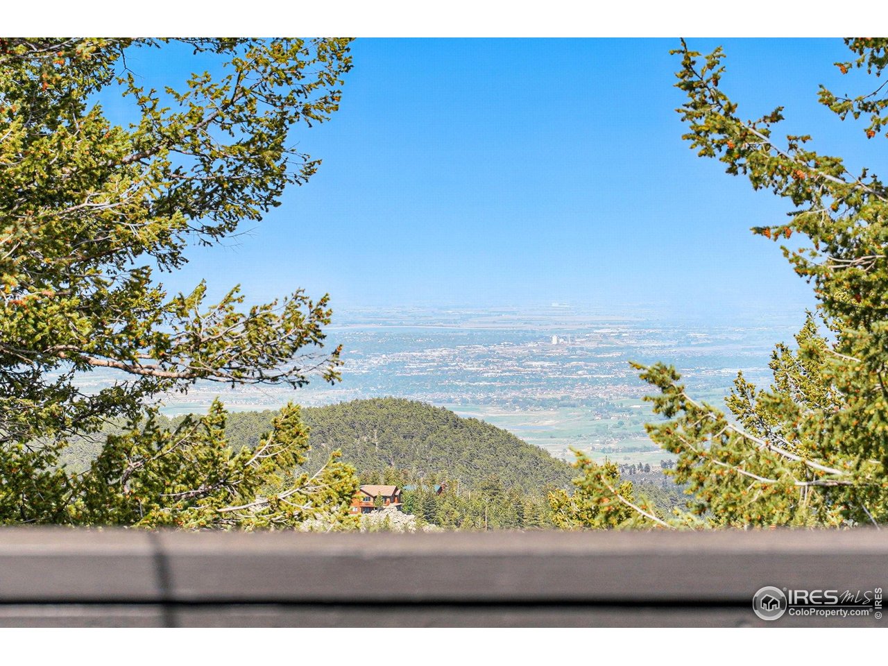 1750 Deer Trail Road Boulder, CO 80302 - Photo 19 of 50 a view of a lake with a mountain in the back