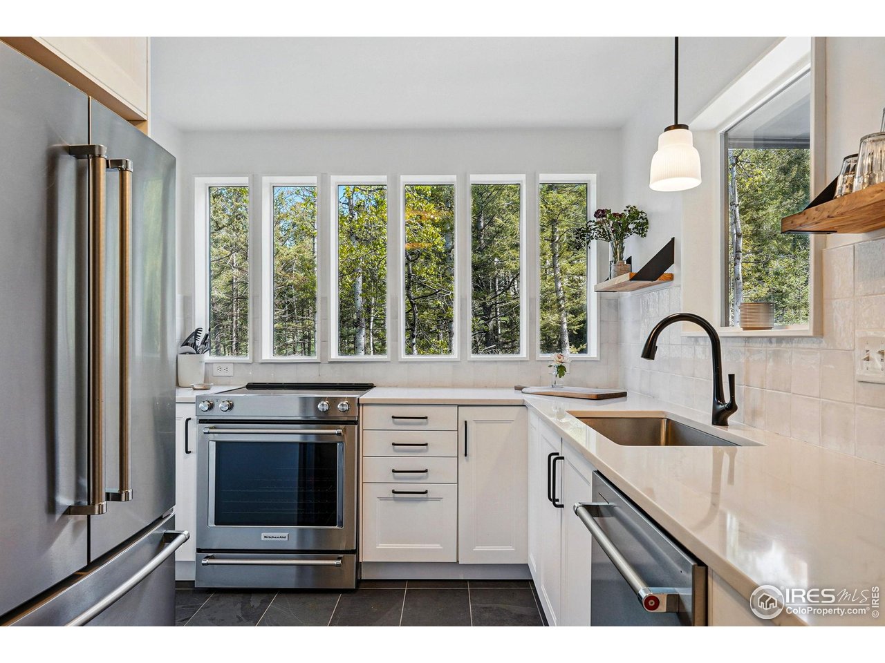 1750 Deer Trail Road Boulder, CO 80302 - Photo 23 of 50 a kitchen with a stove and a sink