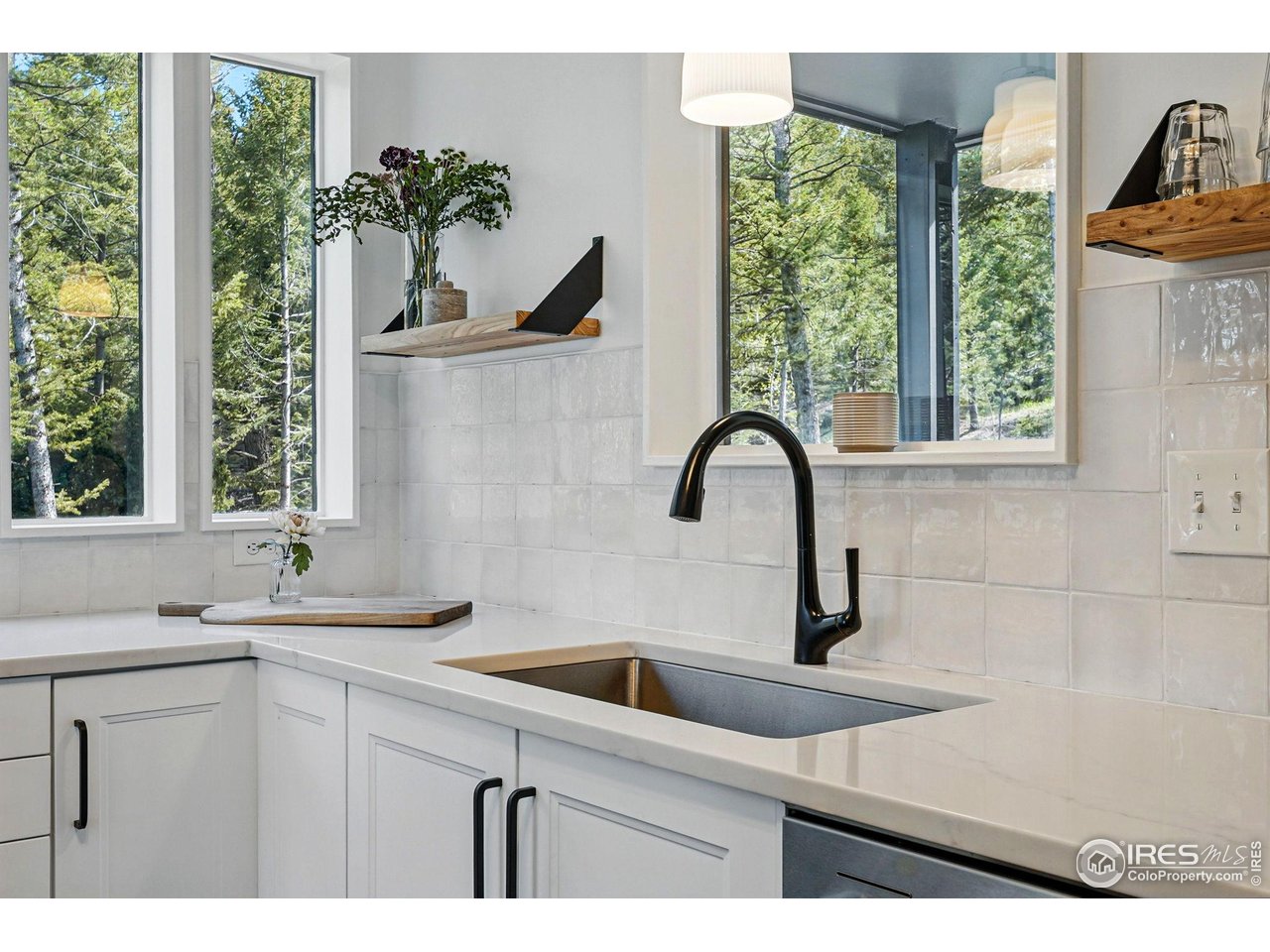 1750 Deer Trail Road Boulder, CO 80302 - Photo 27 of 50 a kitchen with a sink and a window