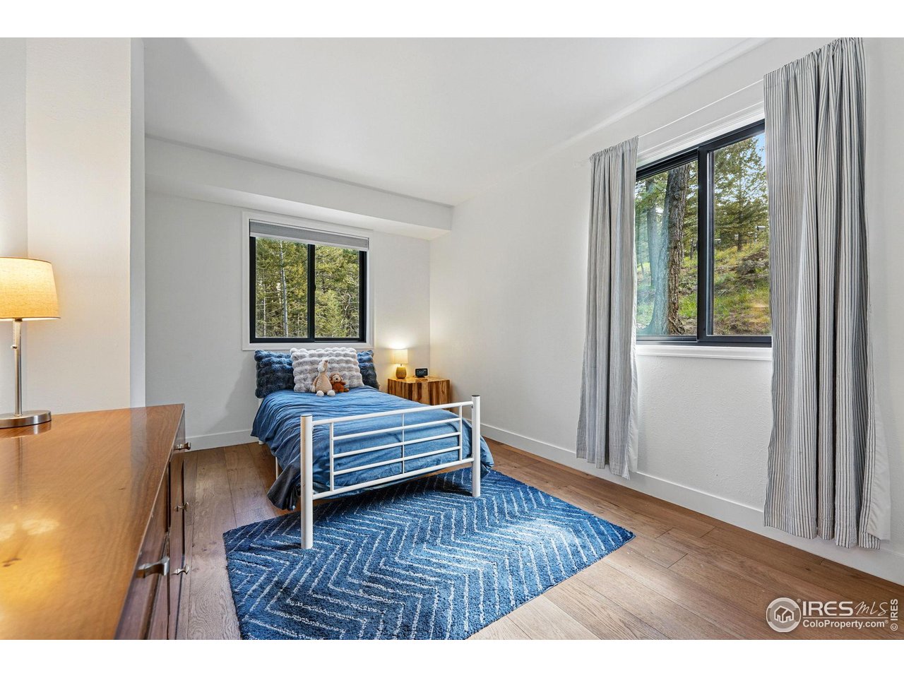 1750 Deer Trail Road Boulder, CO 80302 - Photo 34 of 50 a living room with furniture and a window