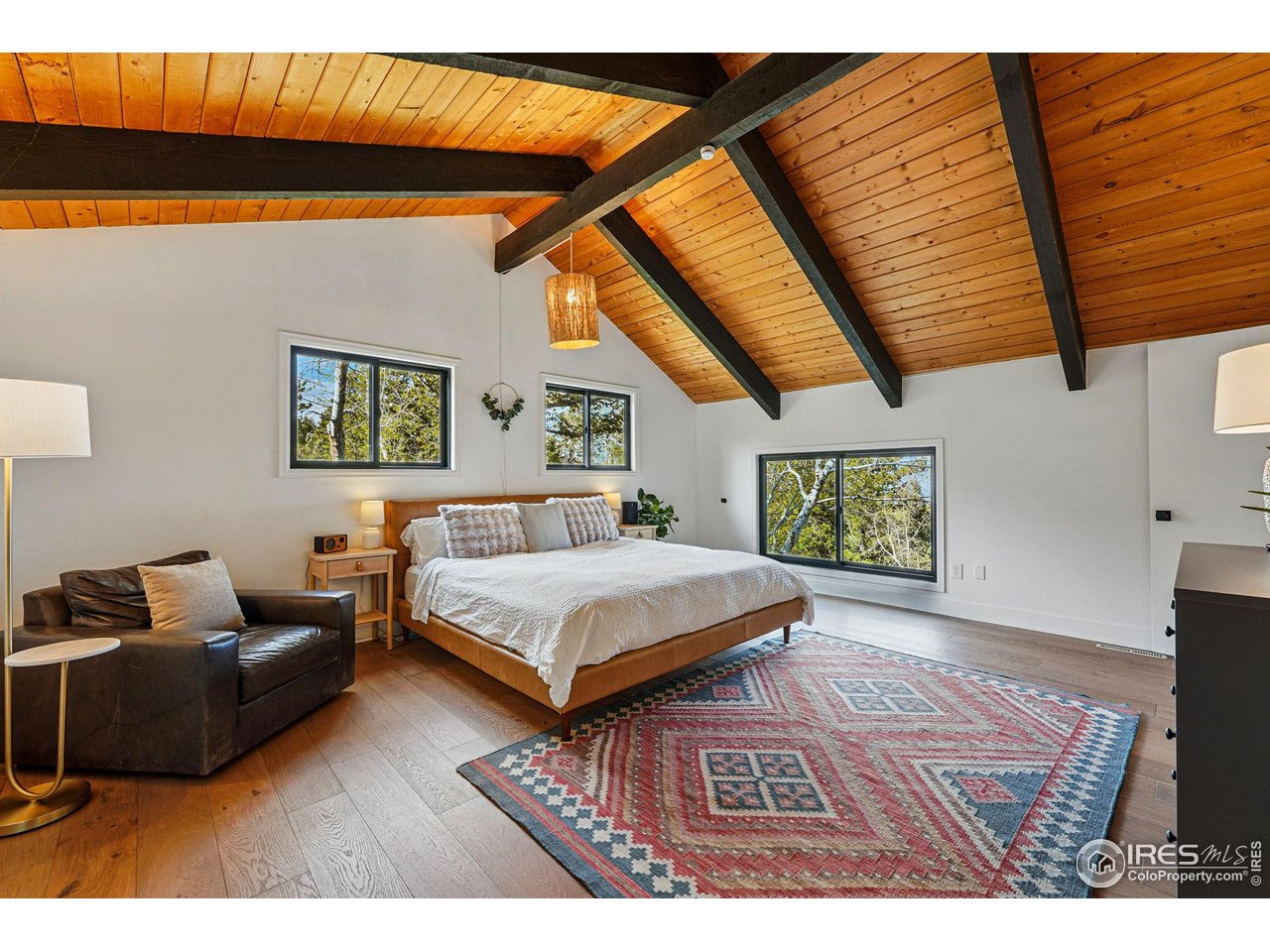 1750 Deer Trail Road Boulder, CO 80302 - Photo 36 of 50 a bedroom with furniture and a window