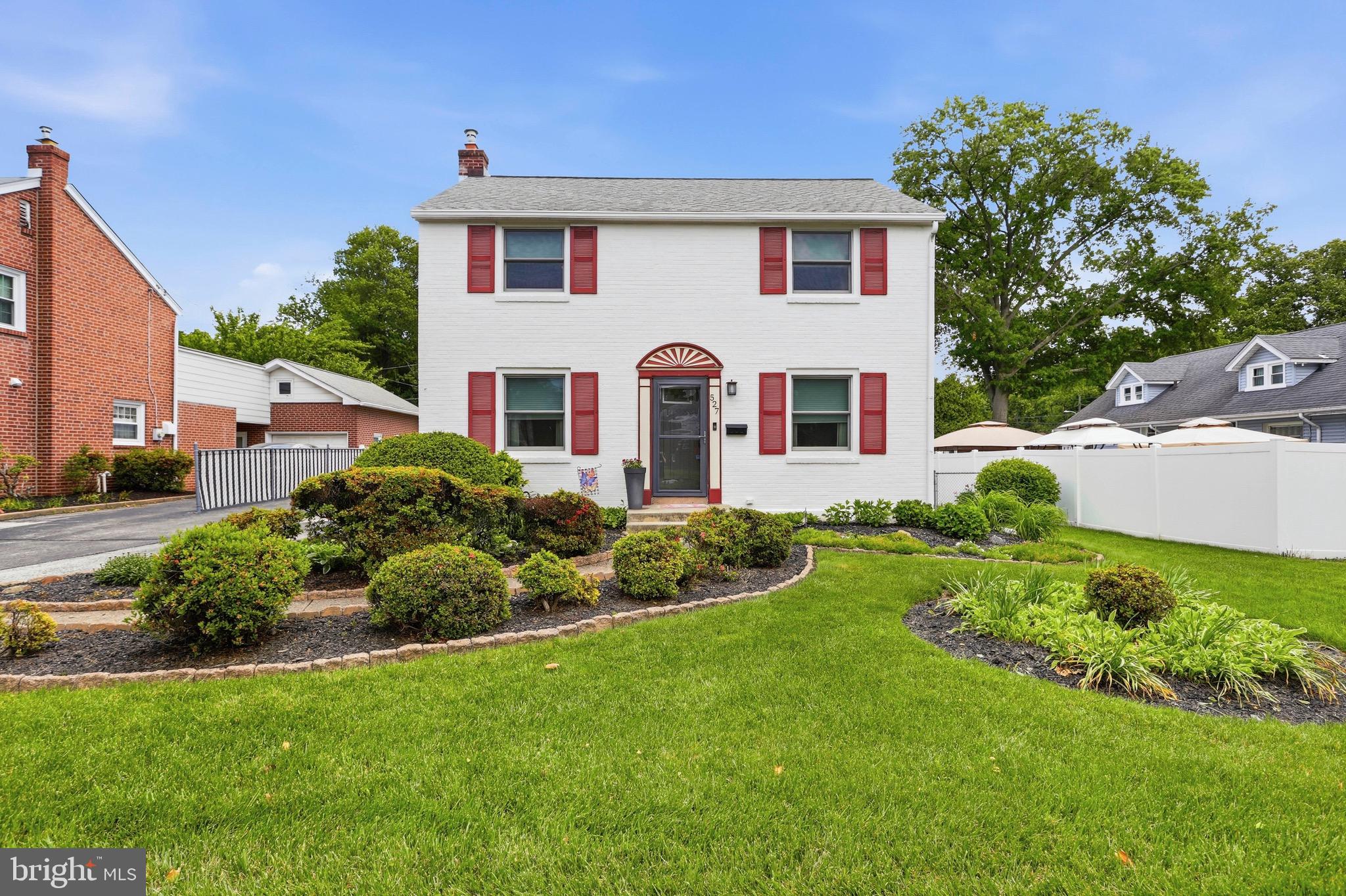527 Saxer Avenue Springfield, PA 19064 - Photo 1 of 33 a front view of a house with a yard