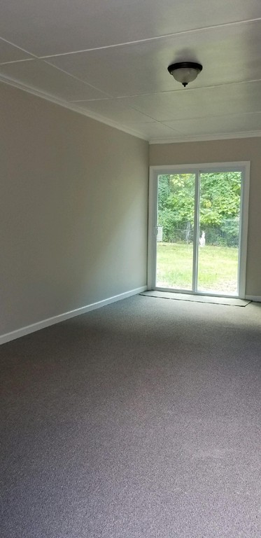 75 Fitzgerald Road Springfield, MA 01104 - Photo 7 of 16 a view of a room that has a window in it