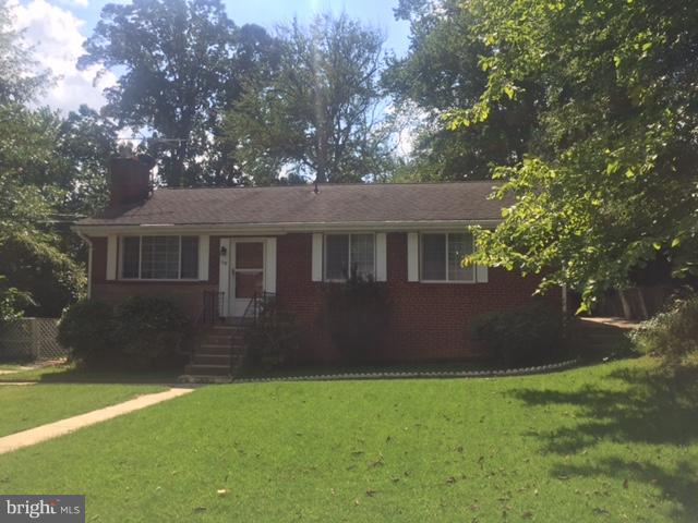 7137 Rice Street Falls Church, VA 22042 - Photo 2 of 17 a house view with a garden space