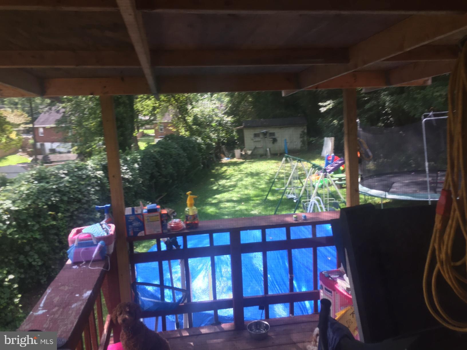 7137 Rice Street Falls Church, VA 22042 - Photo 14 of 17 a view of a chairs and table in the patio