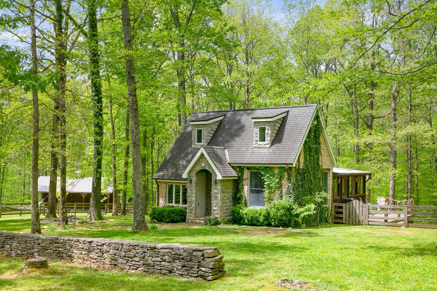5672 Pinewood Road Franklin, TN 37064 - Photo 1 of 55 a front view of a house with a yard