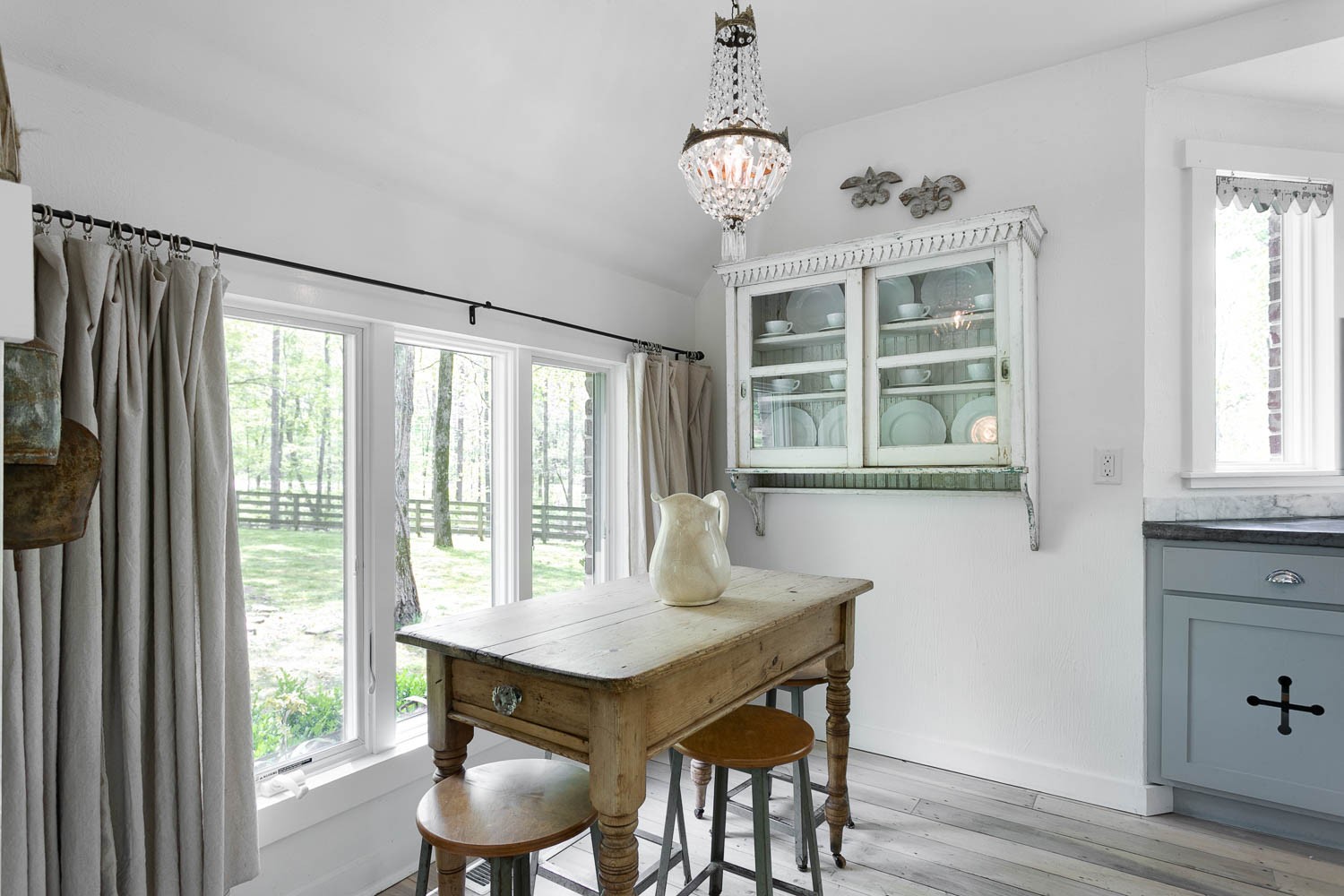 5672 Pinewood Road Franklin, TN 37064 - Photo 11 of 55 a view of a dining room with furniture windows and wooden floor