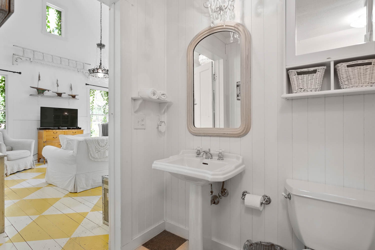 5672 Pinewood Road Franklin, TN 37064 - Photo 16 of 55 a bathroom with a sink a toilet and mirror