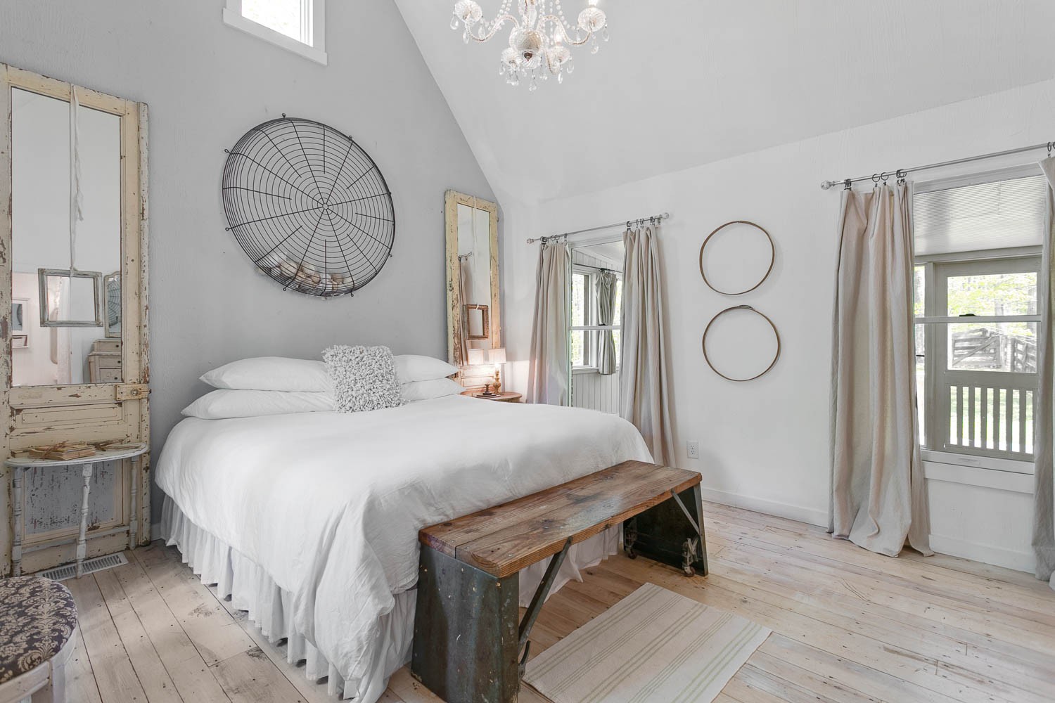 5672 Pinewood Road Franklin, TN 37064 - Photo 17 of 55 a bedroom with a bed and a chandelier
