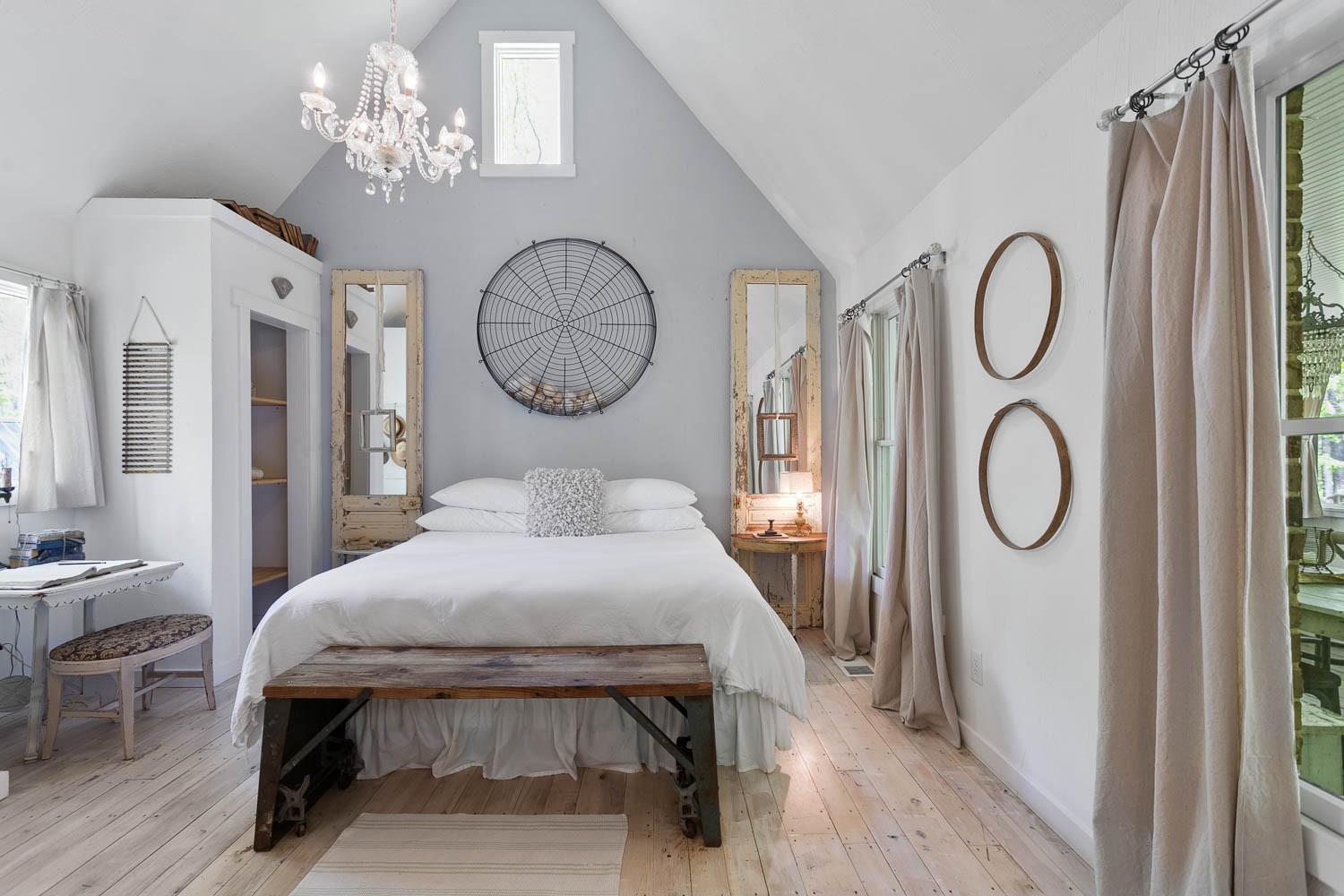 5672 Pinewood Road Franklin, TN 37064 - Photo 18 of 55 a bedroom with bed and a chandelier
