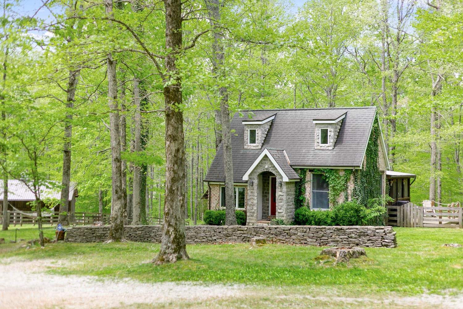 5672 Pinewood Road Franklin, TN 37064 - Photo 2 of 55 a front view of a house with garden